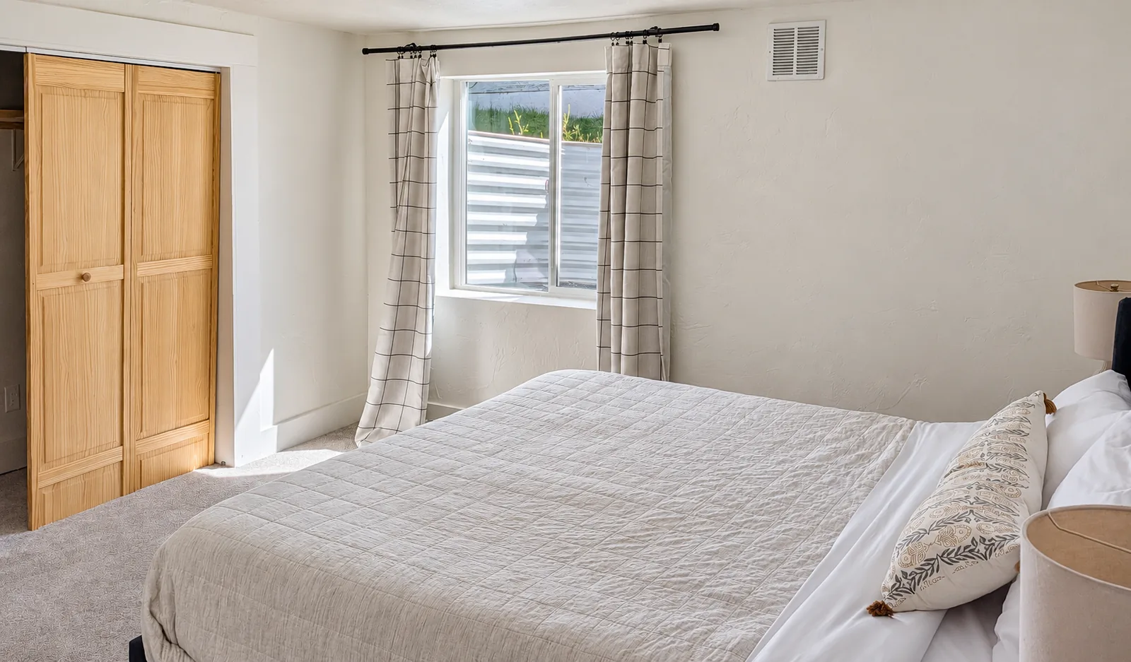 A welcoming bedroom prepared for arriving guests